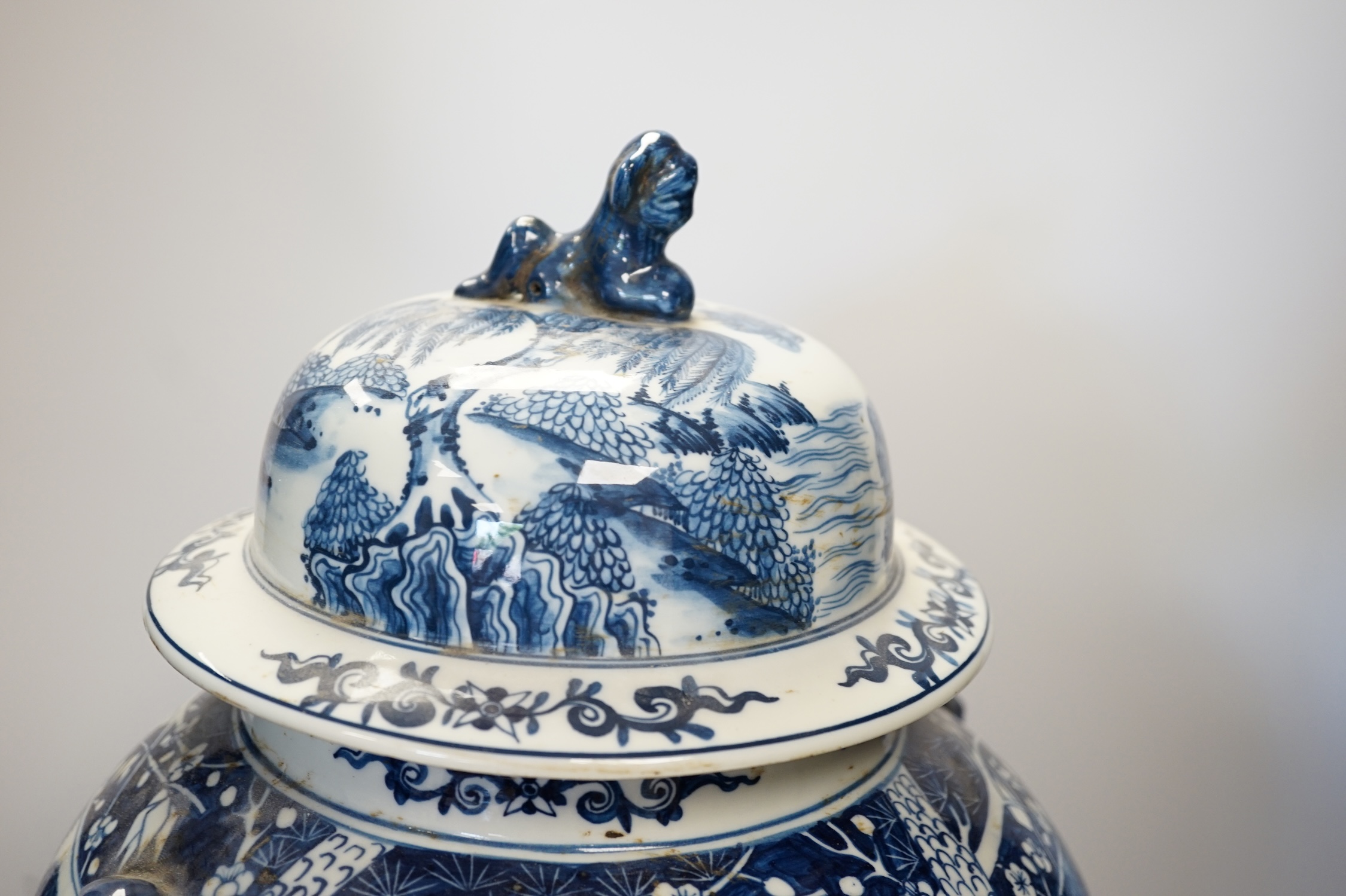 A large Chinese blue and white jar and cover, 50cm high. Condition - fair